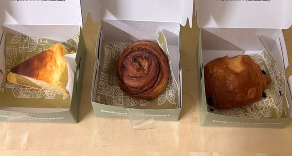 Basque cheesecake, a cinnamon roll and a pain au chocolat from Beanlore